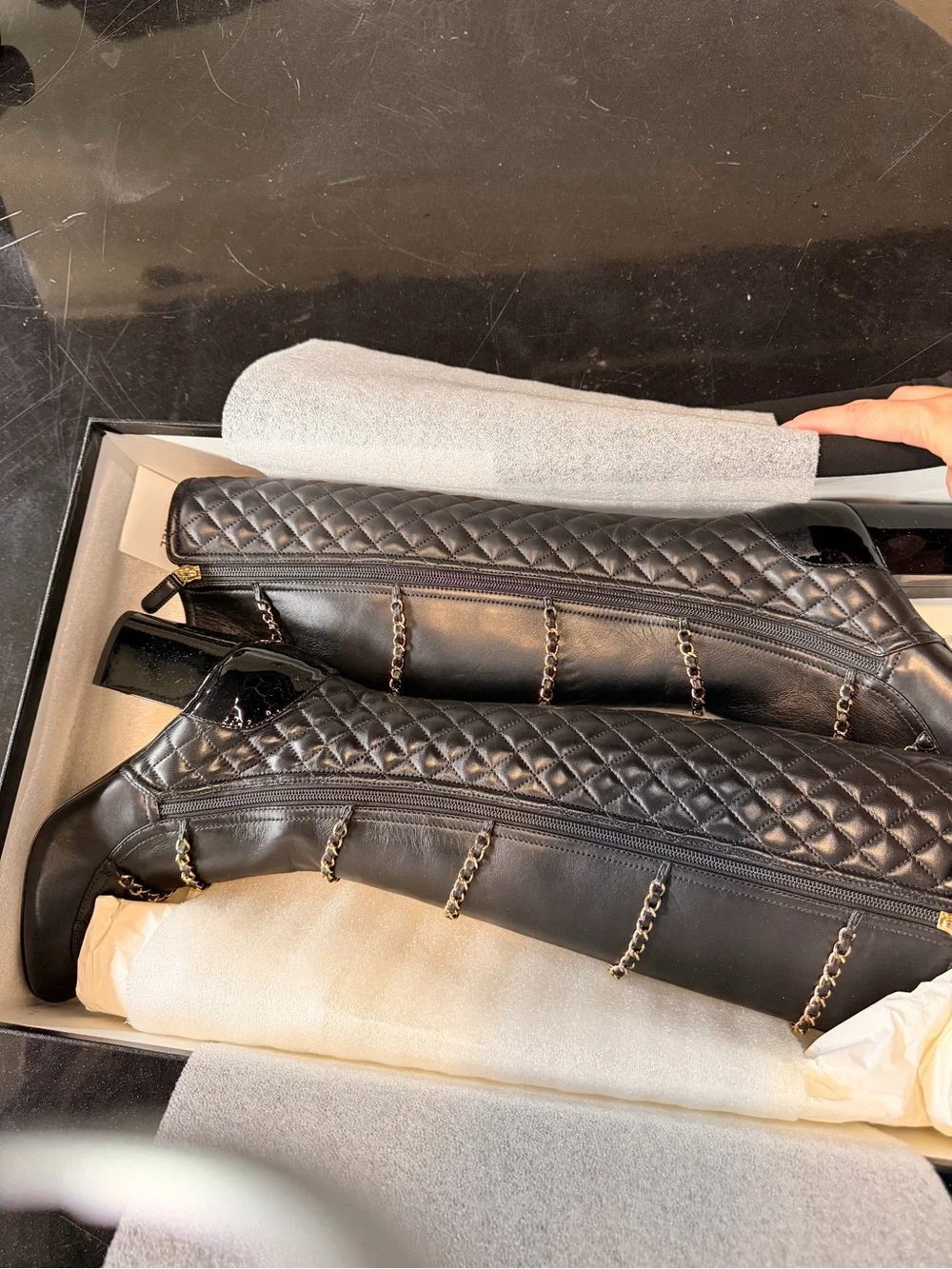 CHANEL Black Quilted Knee-High Chain-Trim Boots